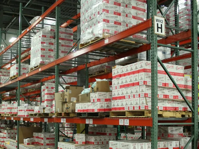 Pallet racks stocked with cases in a distribution warehouse